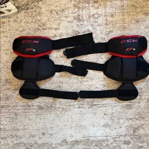 CCM KP15 Black and Red Knee Guards